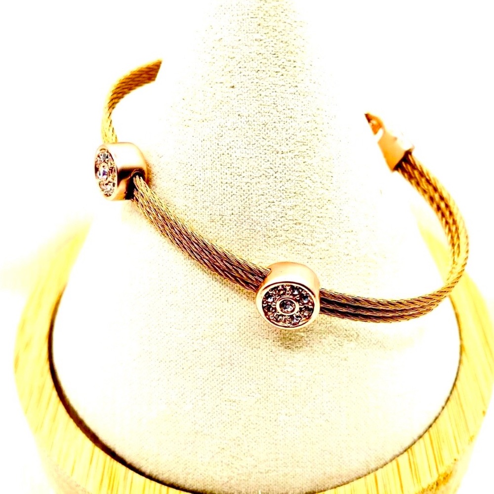 rose gold-toned cable wire bracelet featuring crystal-studded cylindrical